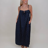 Kerry Polka Dot Midi Dress in navy with white polka dots and tie straps — Paper Doll
