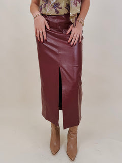 Hailey Midi Skirt in burgundy faux leather with front slit — Paper Doll