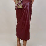 Hailey Midi Skirt in burgundy faux leather with front slit — Paper Doll