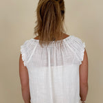 Hadleigh Smocked Neckline Blouse in white with tie neckline and flutter sleeves — Paper Doll