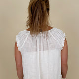 Hadleigh Smocked Neckline Blouse in white with tie neckline and flutter sleeves — Paper Doll