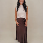 Blair Mock Neck Knit Top in cream with a textured rib knit, mock neckline, sleeveless cap shoulders, and a ribbed waist hem