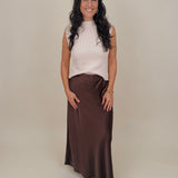 Blair Mock Neck Knit Top in cream with a textured rib knit, mock neckline, sleeveless cap shoulders, and a ribbed waist hem