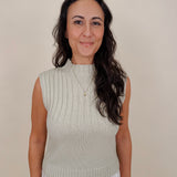 Blair Mock Neck Knit Top in soft light green with a textured rib knit, mock neckline, sleeveless cap shoulders, and a ribbed waist hem