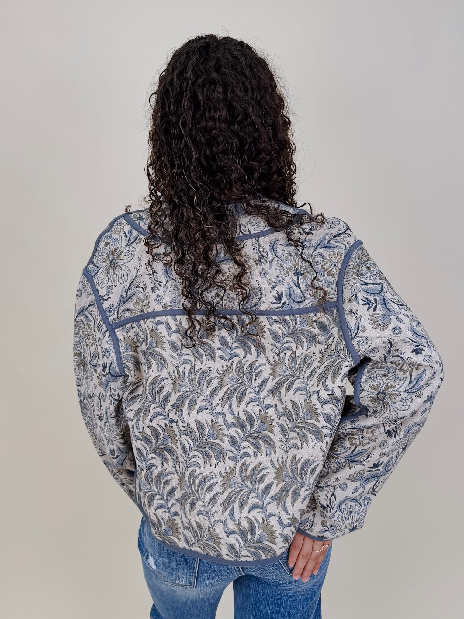 George Town Floral Jacket in sage and blue floral print with contrast piping