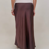 Juliette Satin Midi Skirt in chocolate brown with a smooth elastic waist and a bias cut silhouette that flares softly at the hem