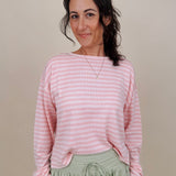 Kingston Striped Sweater in blush pink and ivory stripes with a relaxed drop shoulder, boxy body, and long sleeves in a lightweight knit.