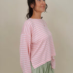 Kingston Striped Sweater in blush pink and ivory stripes with a relaxed drop shoulder, boxy body, and long sleeves in a lightweight knit.