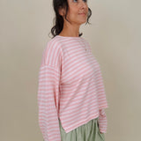 Kingston Striped Sweater in blush pink and ivory stripes with a relaxed drop shoulder, boxy body, and long sleeves in a lightweight knit.