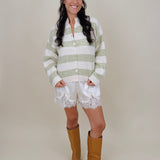 Melanie Striped Cardigan in sage green and cream stripes with a white button front, ribbed cuffs, and a slightly cropped brushed knit body