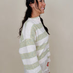 Melanie Striped Cardigan in sage green and cream stripes with a white button front, ribbed cuffs, and a slightly cropped brushed knit body