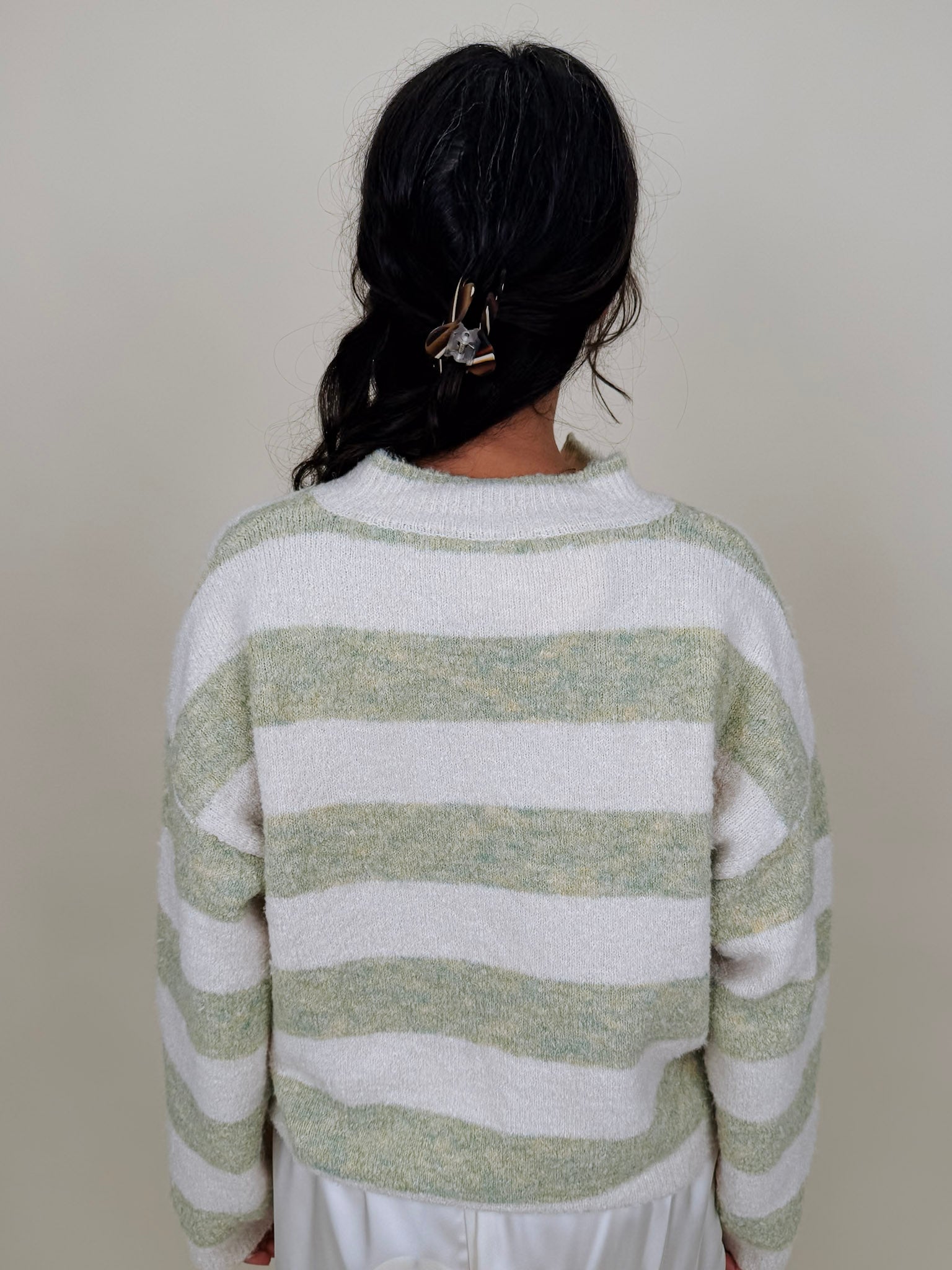 Melanie Striped Cardigan in sage green and cream stripes with a white button front, ribbed cuffs, and a slightly cropped brushed knit body