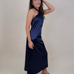 Michelle Midi Dress in navy satin with twisted halter neckline
