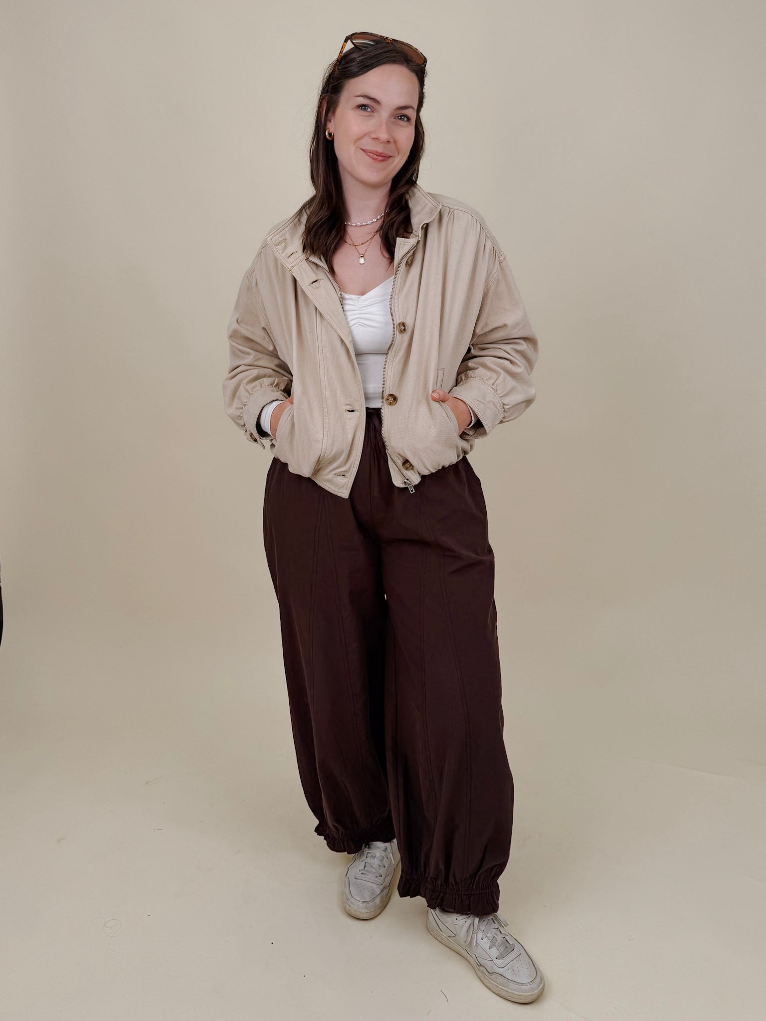 Pumpkin Patch Denim Jacket in soft beige with tortoise buttons over a hidden zip front, gathered shoulders, welt pockets, and an elastic bubble hem