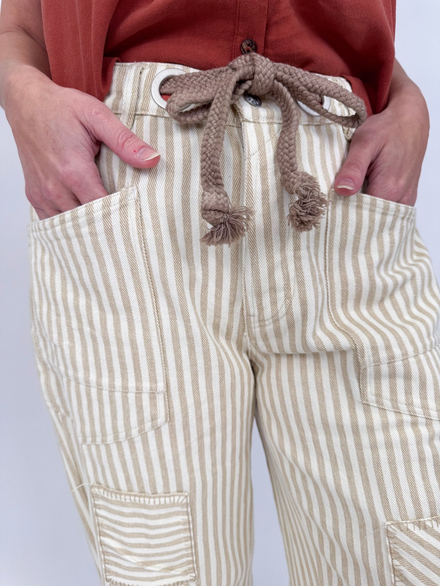 Lena Striped Pant in tan and ivory stripe cotton with rope belt, utility cargo pockets, and straight leg silhouette