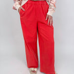 Summer Day Pant in bold red cotton with elastic waistband, side pockets, and wide leg silhouette