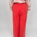 Summer Day Pant in bold red cotton with elastic waistband, side pockets, and wide leg silhouette