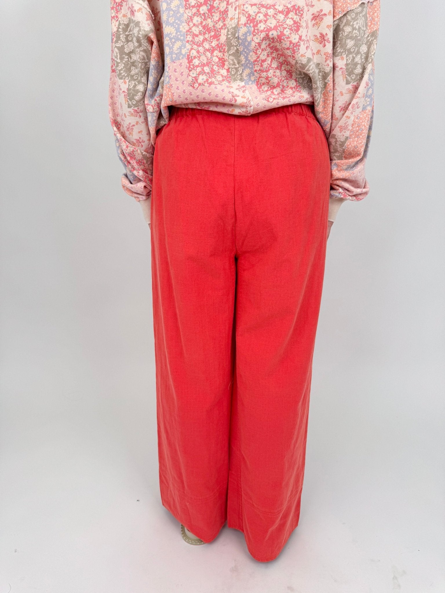 Summer Day Pant in bold red cotton with elastic waistband, side pockets, and wide leg silhouette