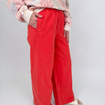 Summer Day Pant in bold red cotton with elastic waistband, side pockets, and wide leg silhouette