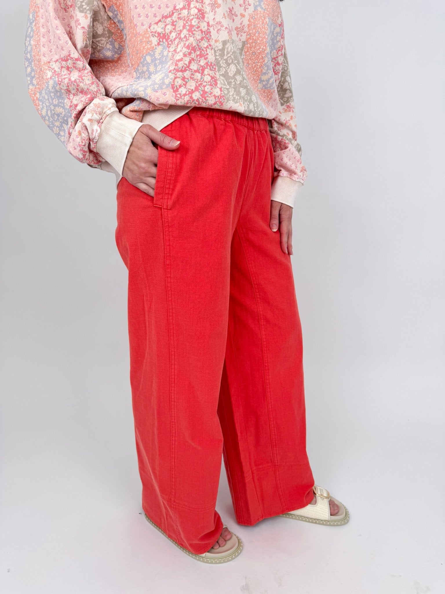 Summer Day Pant in bold red cotton with elastic waistband, side pockets, and wide leg silhouette