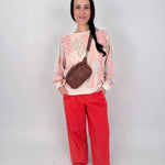 Summer Day Pant in bold red cotton with elastic waistband, side pockets, and wide leg silhouette