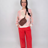 Summer Day Pant in bold red cotton with elastic waistband, side pockets, and wide leg silhouette
