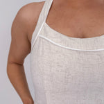 Crazy In Love Halter Neck Dress in natural oatmeal linen blend with halter neckline, fitted bodice, and flowy A line midi skirt