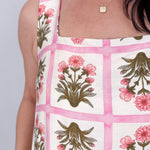 Rita Square Neck Mini Dress in pink and olive tile block print floral with square neckline, wide straps, and A line silhouette