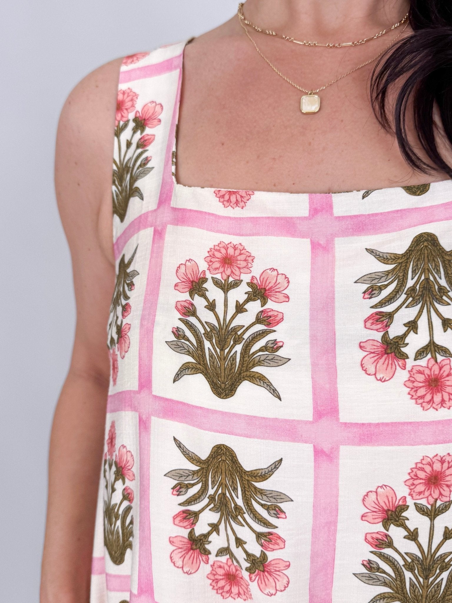 Rita Square Neck Mini Dress in pink and olive tile block print floral with square neckline, wide straps, and A line silhouette