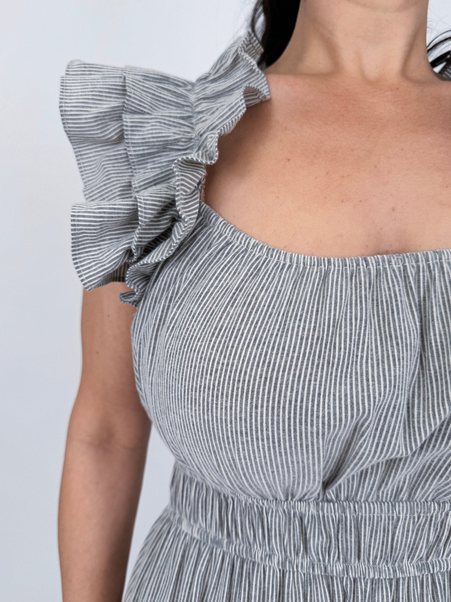 Cheryl Square Neck Midi Dress in gray pinstripe with layered ruffle sleeves, elastic waist, and full tiered midi skirt