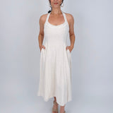 Crazy In Love Halter Neck Dress in natural oatmeal linen blend with halter neckline, fitted bodice, and flowy A line midi skirt