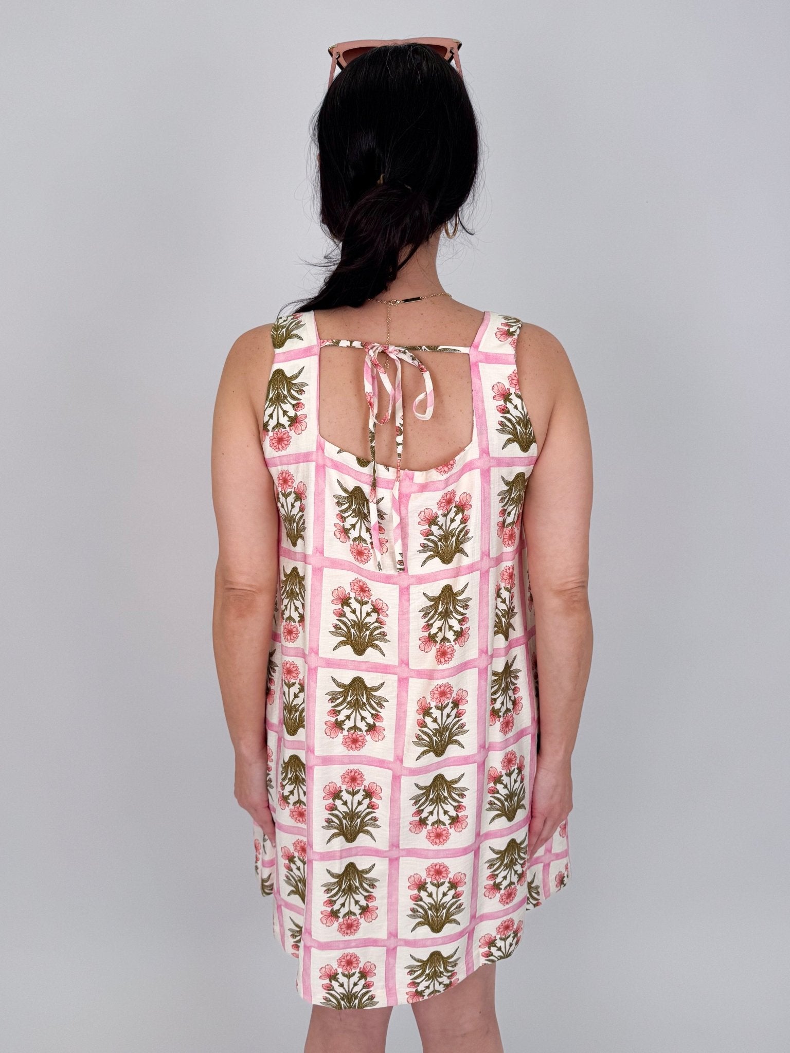 Rita Square Neck Mini Dress in pink and olive tile block print floral with square neckline, wide straps, and A line silhouette