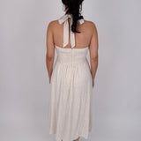 Crazy In Love Halter Neck Dress in natural oatmeal linen blend with halter neckline, fitted bodice, and flowy A line midi skirt
