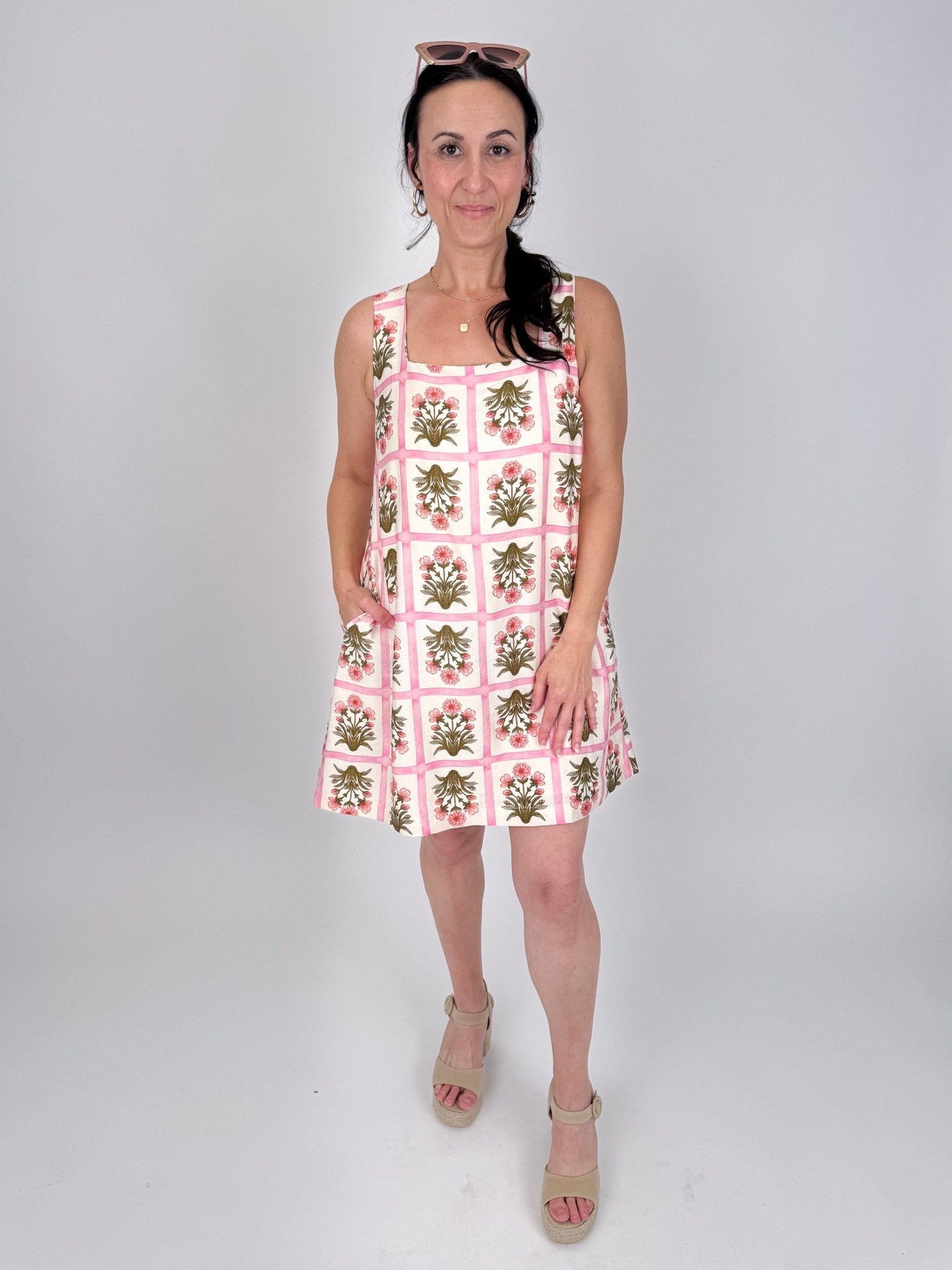 Rita Square Neck Mini Dress in pink and olive tile block print floral with square neckline, wide straps, and A line silhouette