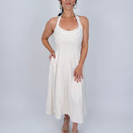 Crazy In Love Halter Neck Dress in natural oatmeal linen blend with halter neckline, fitted bodice, and flowy A line midi skirt