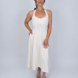 Crazy In Love Halter Neck Dress in natural oatmeal linen blend with halter neckline, fitted bodice, and flowy A line midi skirt