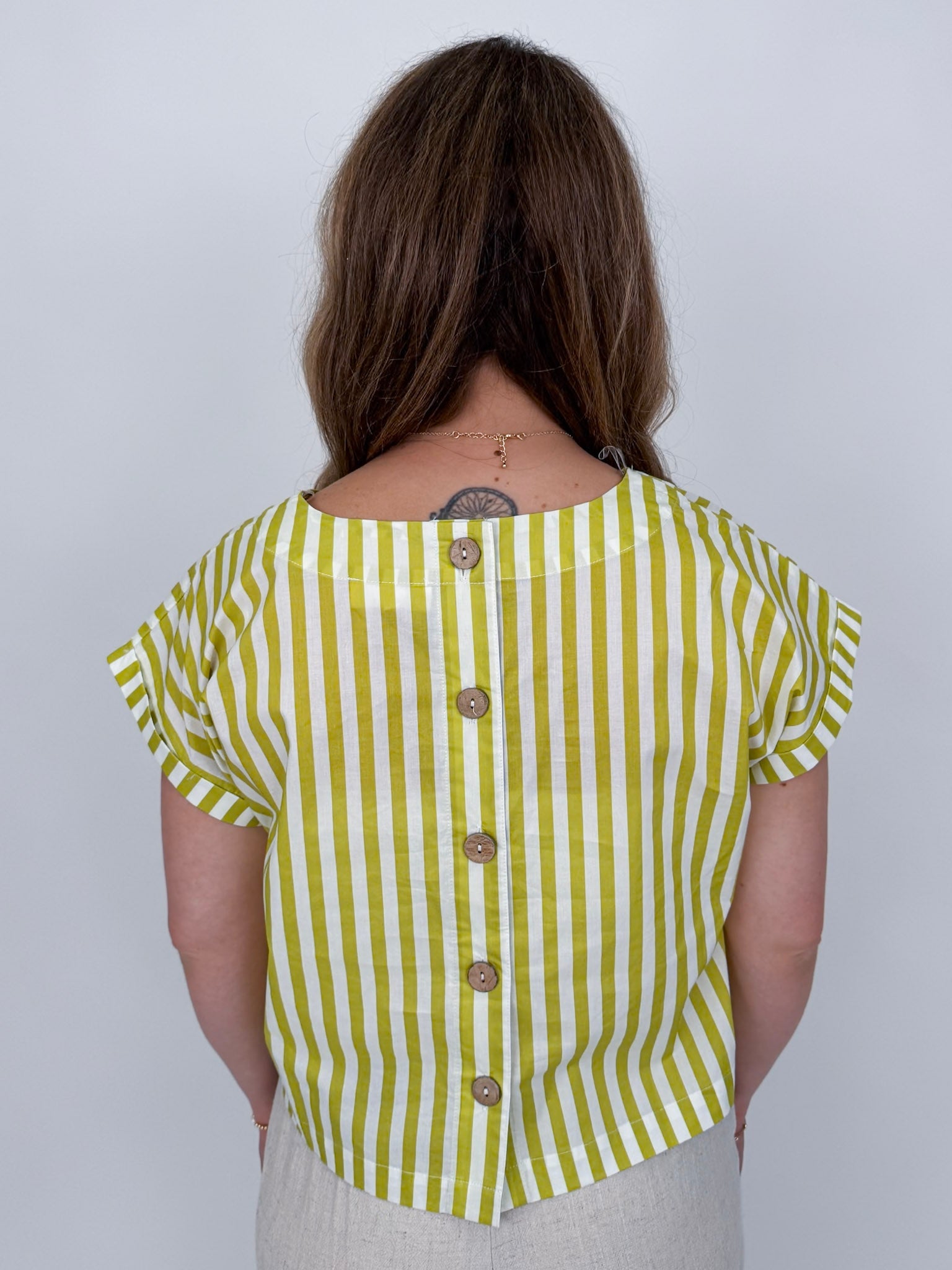 Missy Striped Top in lime green and white stripe with flutter sleeves and button-back closure — Paper Doll
