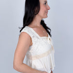 If You Wish Lace Detail Blouse in ivory with lace overlay bodice, tie front sweetheart neckline, crochet waist trim, and ribbed peplum hem