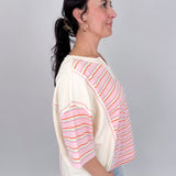 To See You Smile Stripe Top in pink multi stripe with ivory contrast panels, notch neckline, and relaxed boxy fit