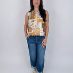 Jenny Lee Mixed Print Blouse in golden amber patchwork floral print with high round neckline and sleeveless silhouette