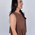 Betsey Pleated Blouse in mocha and off white with vertical pleated front, antique button detail, and raw frayed hem
