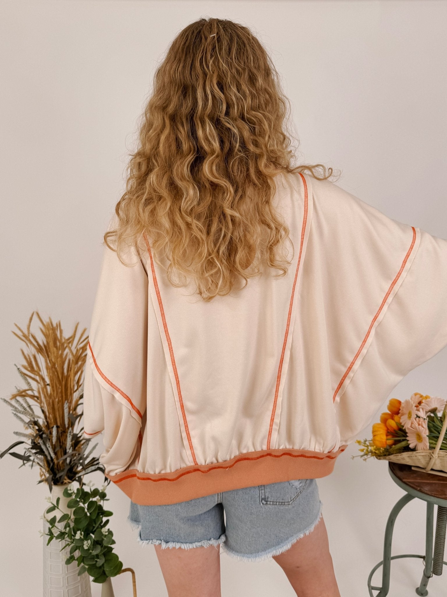 Free Bird Boho Knit Top with cream knit and gingham American flag appliqué — Paper Doll
