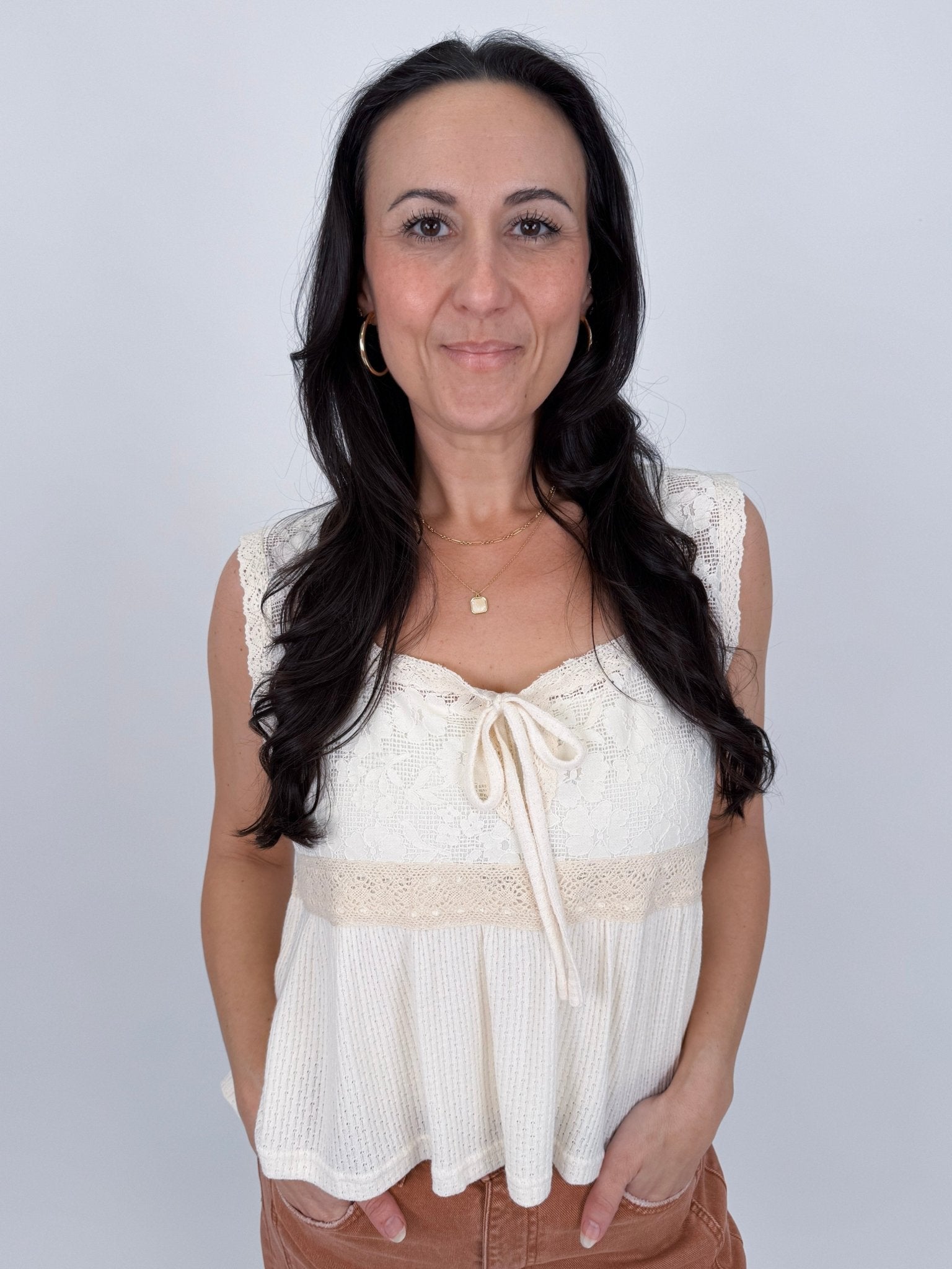 If You Wish Lace Detail Blouse in ivory with lace overlay bodice, tie front sweetheart neckline, crochet waist trim, and ribbed peplum hem