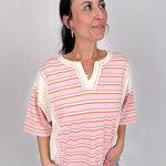 To See You Smile Stripe Top in pink multi stripe with ivory contrast panels, notch neckline, and relaxed boxy fit