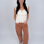 If You Wish Lace Detail Blouse in ivory with lace overlay bodice, tie front sweetheart neckline, crochet waist trim, and ribbed peplum hem