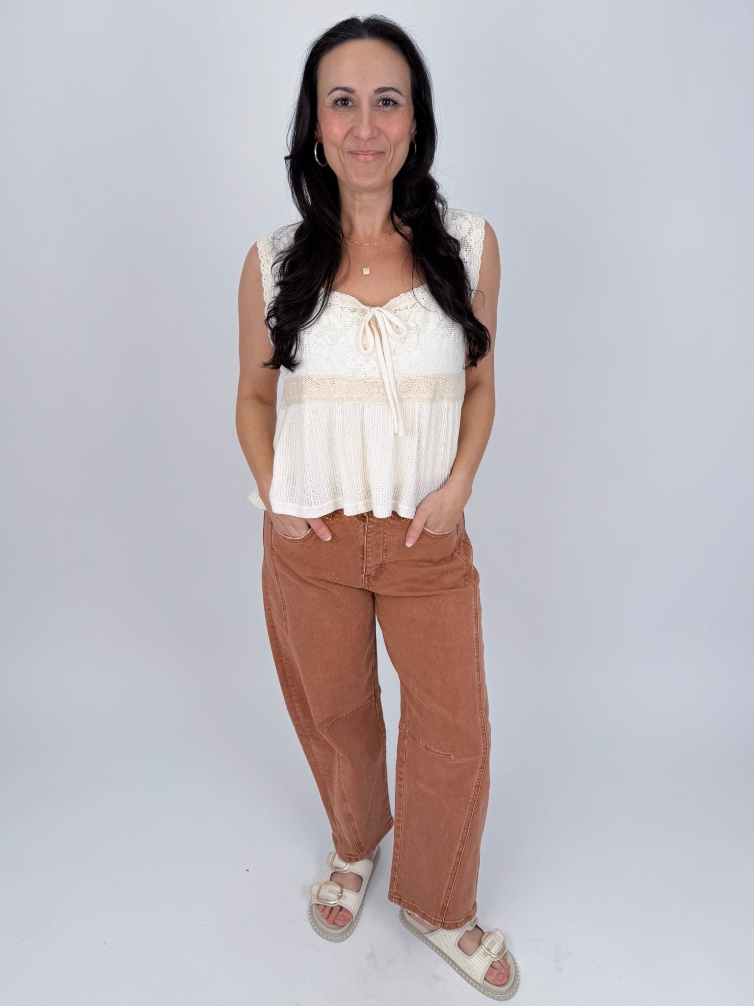 If You Wish Lace Detail Blouse in ivory with lace overlay bodice, tie front sweetheart neckline, crochet waist trim, and ribbed peplum hem