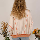 Free Bird Boho Knit Top with cream knit and gingham American flag appliqué — Paper Doll
