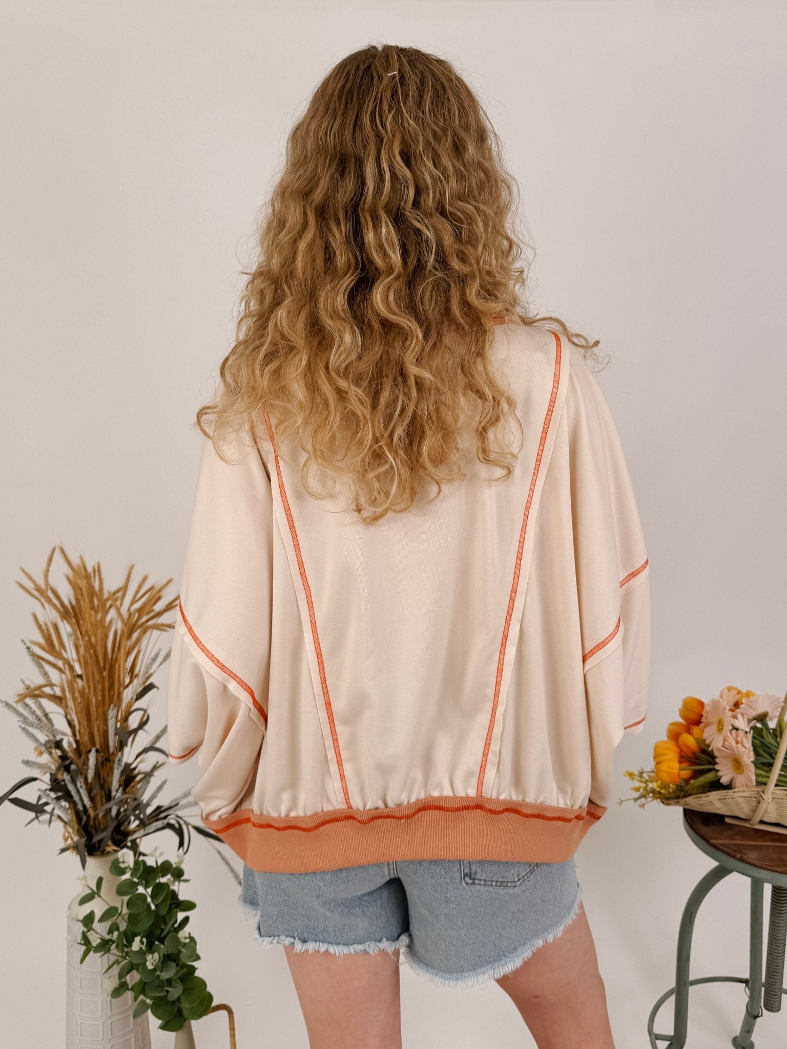 Free Bird Boho Knit Top with cream knit and gingham American flag appliqué — Paper Doll
