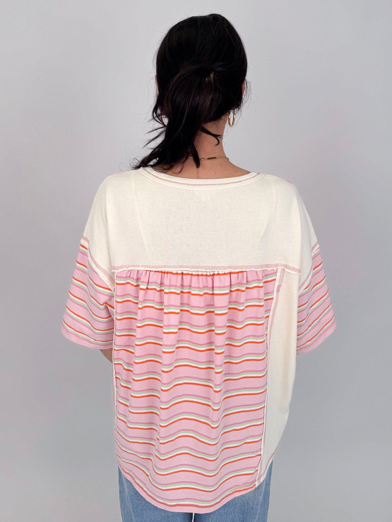 To See You Smile Stripe Top in pink multi stripe with ivory contrast panels, notch neckline, and relaxed boxy fit