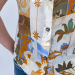 Jenny Lee Mixed Print Blouse in golden amber patchwork floral print with high round neckline and sleeveless silhouette